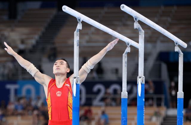 尊享娱乐-邹敬园双杠决战无敌夺冠 体操队巴黎争金还看他？